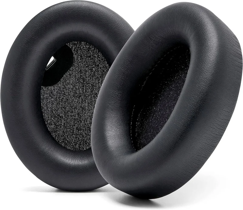 Par de almohadillas ovaladas de cuero sintético negro de los Sony WH-1000XM4, con el interior de tela, sobre fondo blanco
